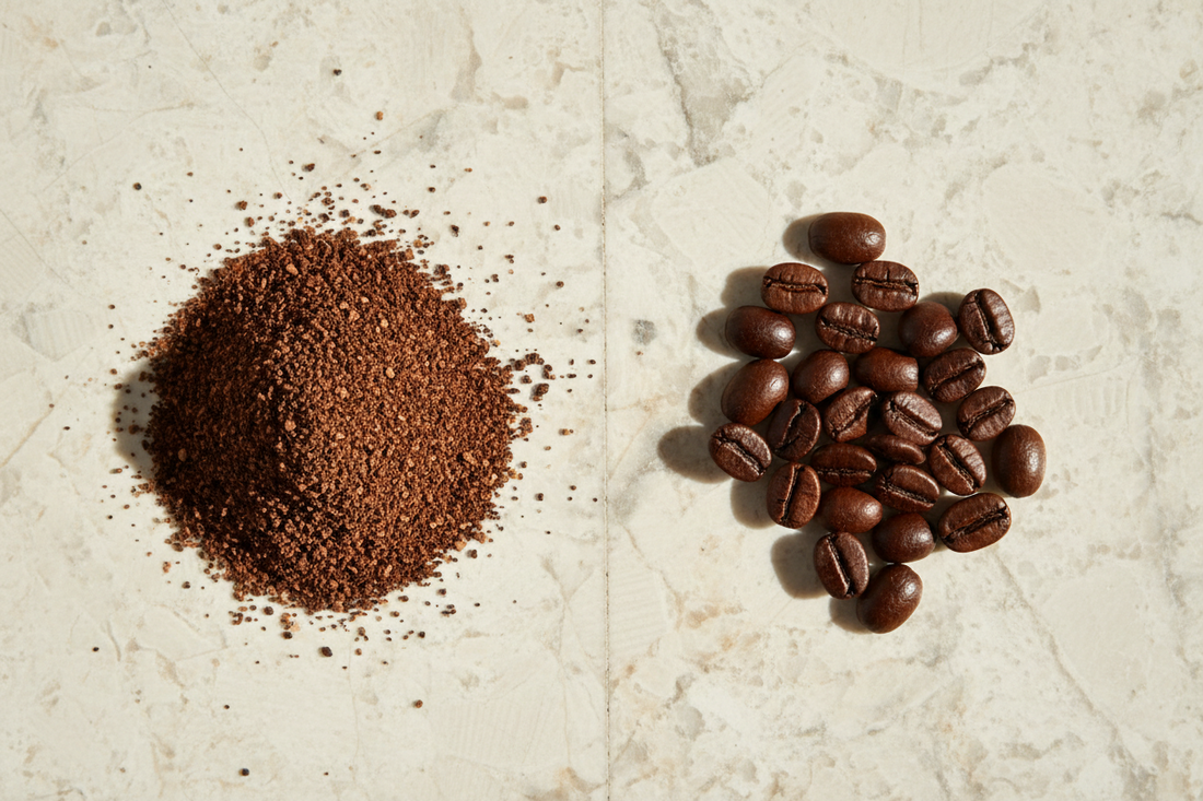 Side-by-side comparison of pre-ground coffee and whole bean coffee on a light stone surface in natural daylight